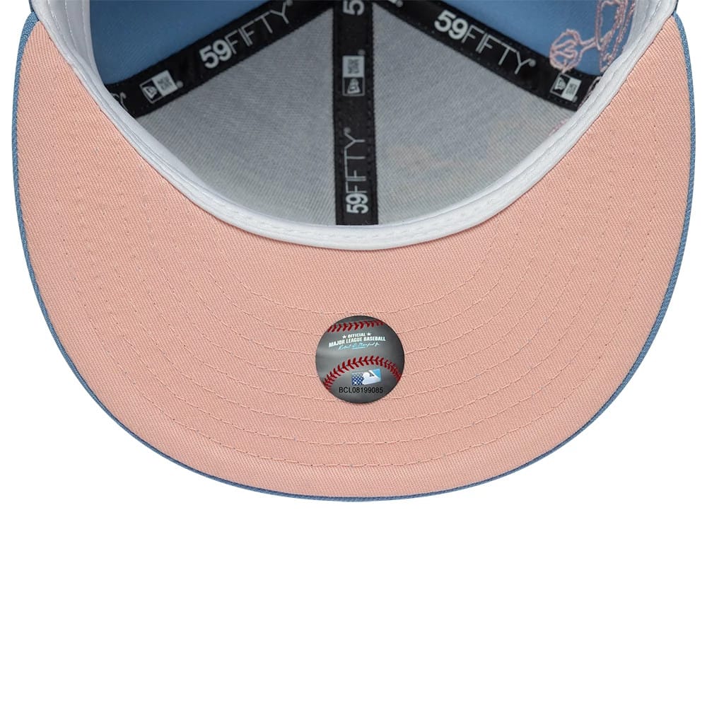 Pictured is this MLB Floral Outline LA Dodgers 59FIFTY Fitted cap in pastel blue. 2