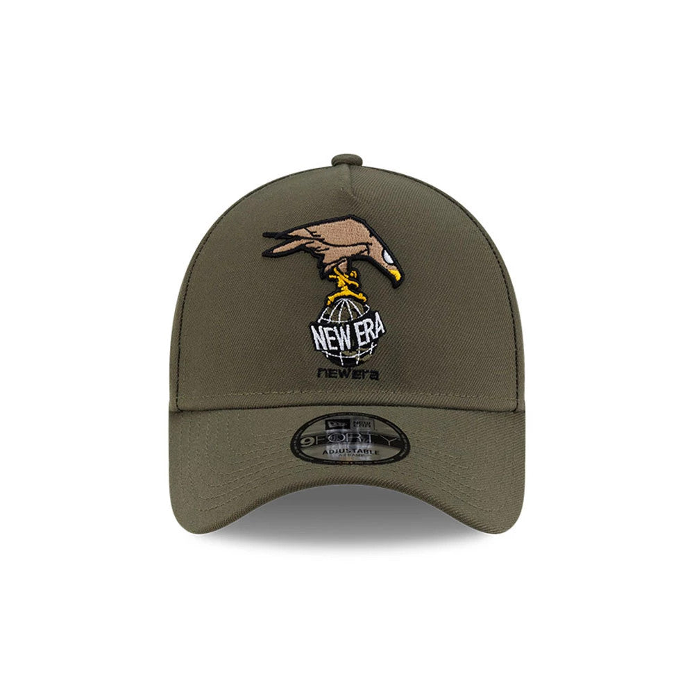 Roji Soccer Green New Era 9FORTY A-Frame Adjustable Cap, front view showing a brown and yellow bird logo above a white embroidered New Era globe design on the structured green crown, with a black 9FORTY size sticker on the curved visor.