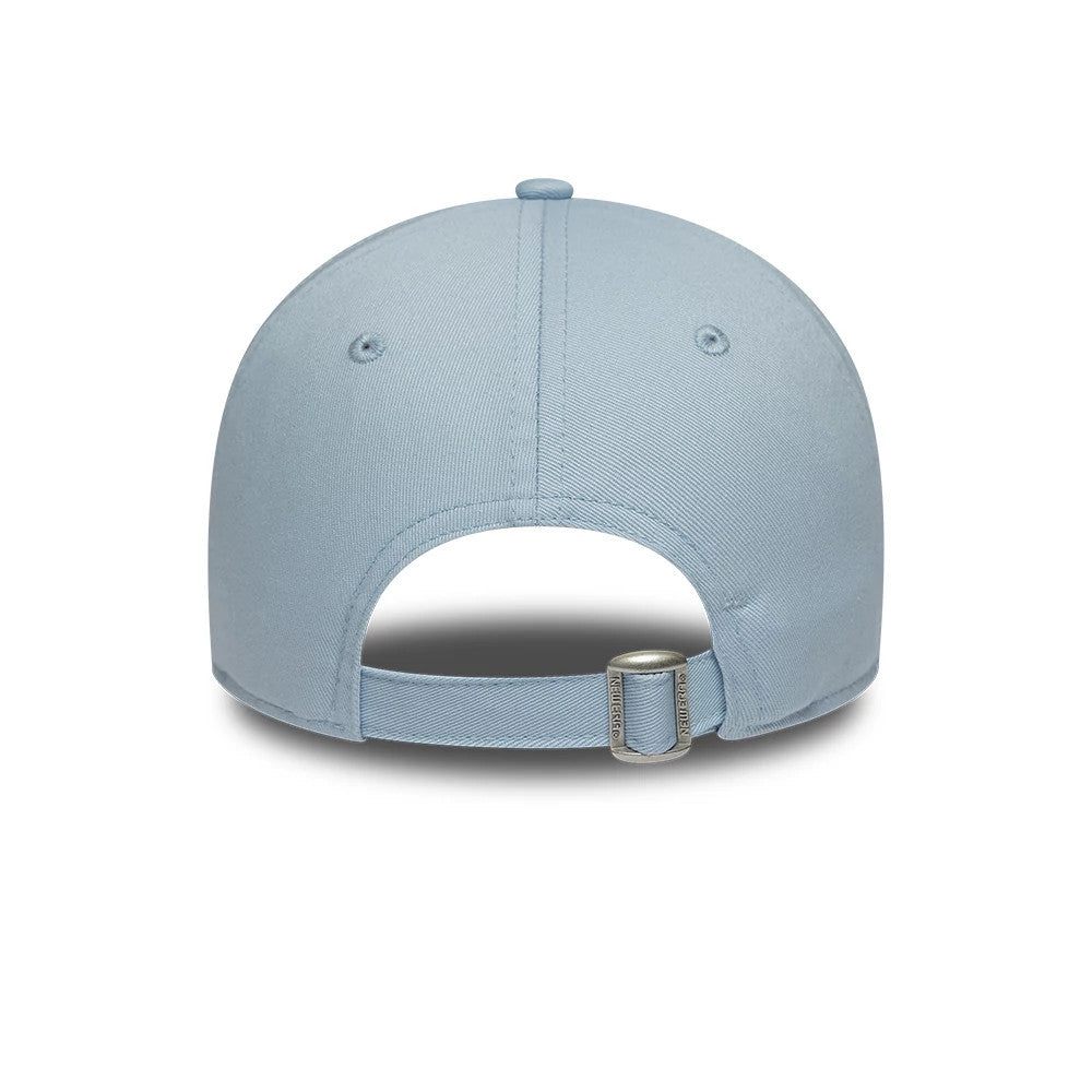 Lacoste X New Era Pastel Blue 9TWENTY Adjustable Cap, rear view showing the pastel blue crown with two embroidered eyelets, a fabric strap with a buckle for size adjustment, and additional stitching detail on the panels.