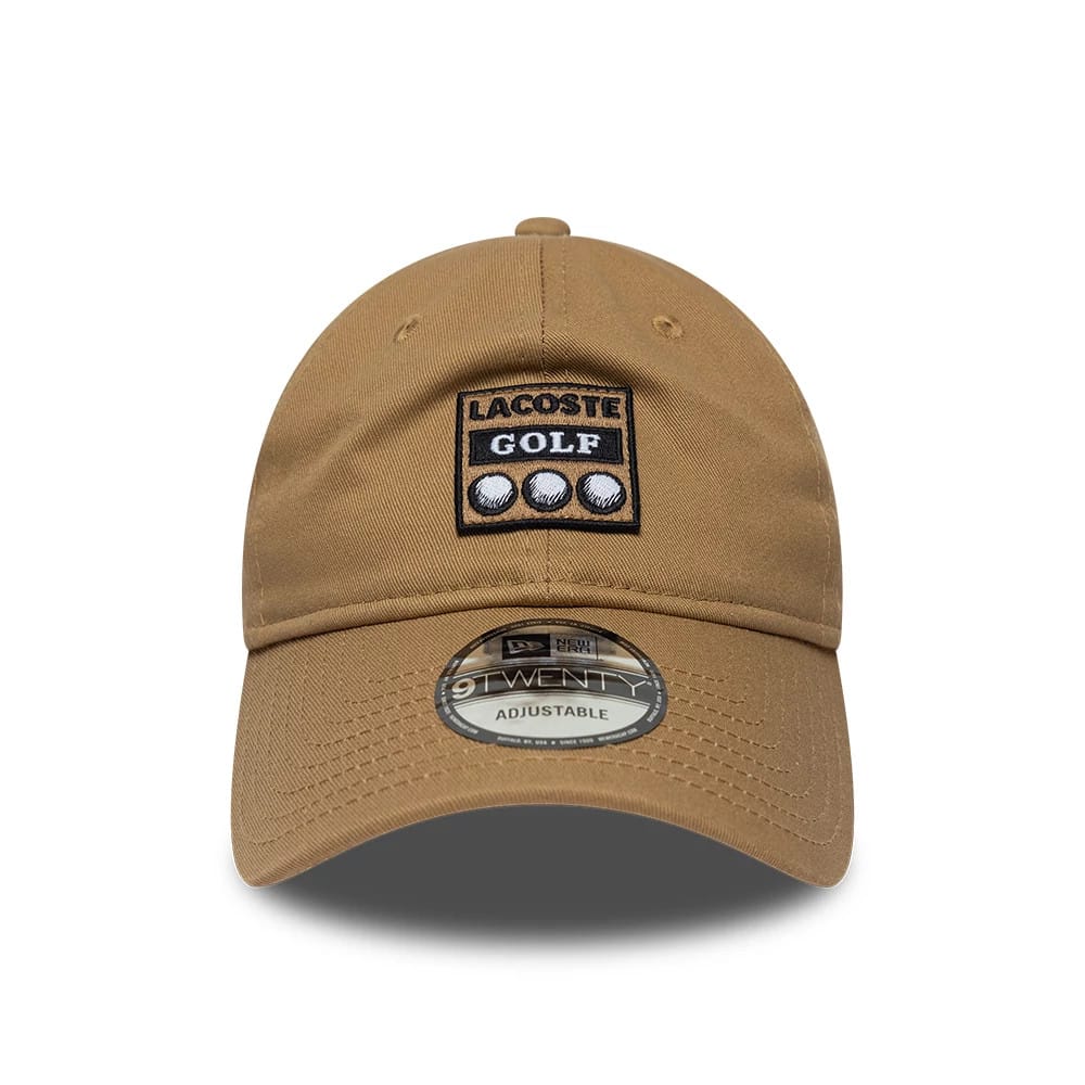 Pictured is this Lacoste X New Era 9TWENTY cap in beige. 2