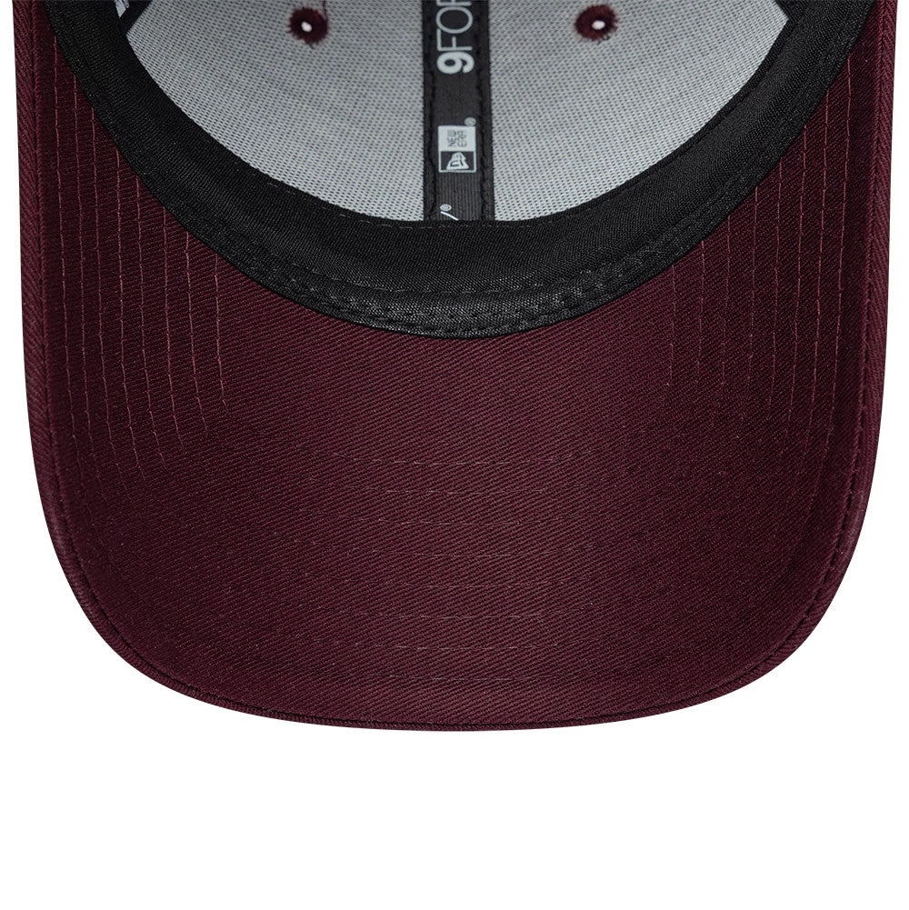 Womens Lacoste X New Era Dark Purple 9FORTY Adjustable Cap, inside view revealing the structured black sweatband, grey internal taping with 9FORTY branding, and a maroon undervisor with stitch lines across the curved edge.