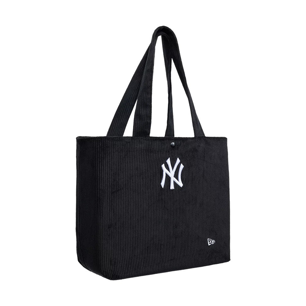 New Era New York Yankees MLB Chunky Cord Black Tote Bag, three-quarter view displaying the rectangular shape with dual handles, the white embroidered New York Yankees logo centred on the front and a small embroidered New Era logo in the lower corner.