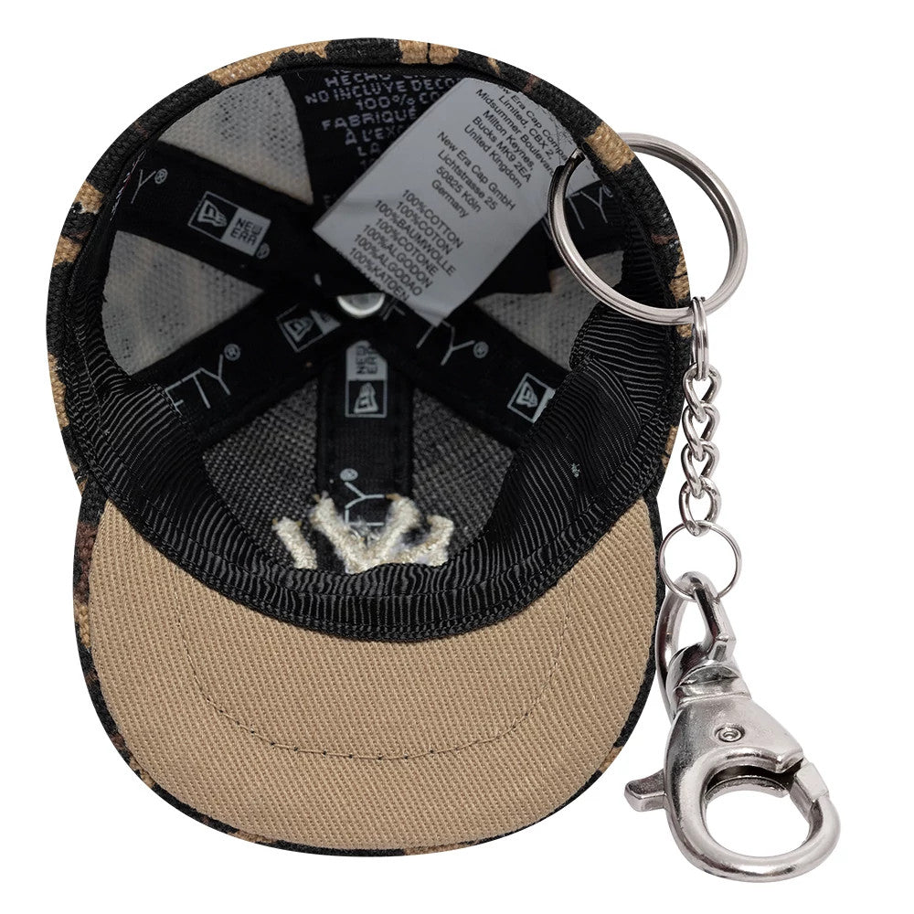 Pictured is this MLB Leo Mini Cap New York Yankees Key Chain in black. 5
