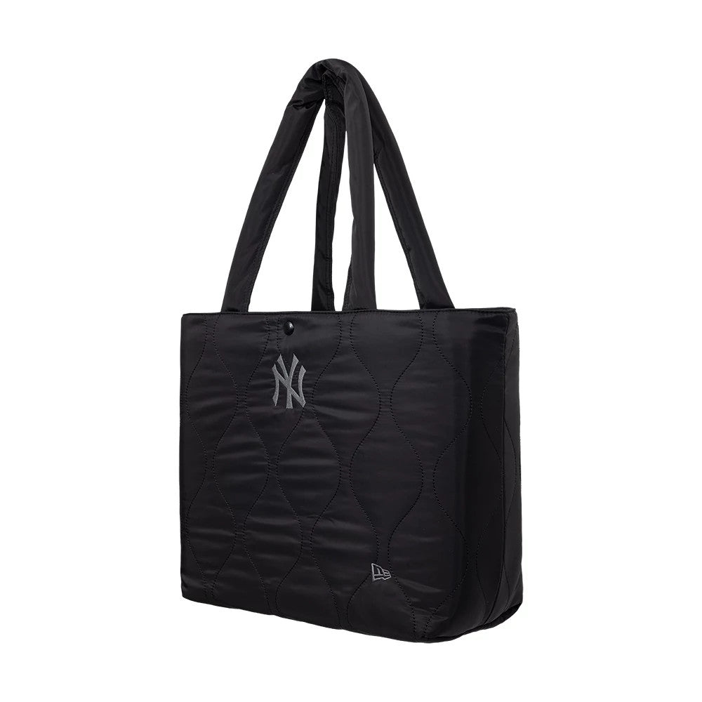 New Era New York Yankees MLB Black Padded Tote Bag, three-quarter view showing a black design with a quilted pattern, featuring an embroidered New York Yankees logo centred on the side and a small New Era logo embroidered near the base.