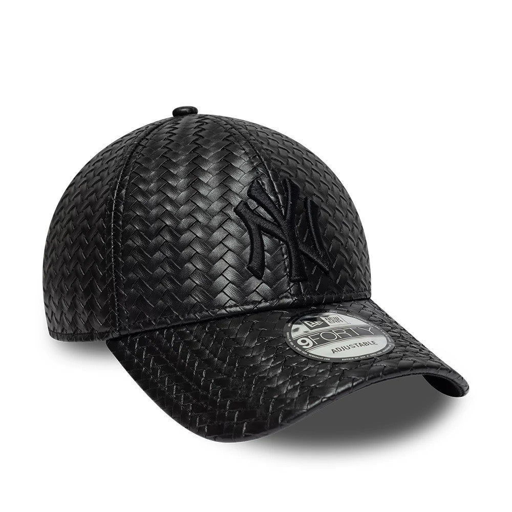 New York Yankees MLB PU Weave Black New Era 9FORTY Adjustable Cap, three-quarter view showing the raised black embroidered NY logo on the front panel, with a woven textured design across the structured black crown.
