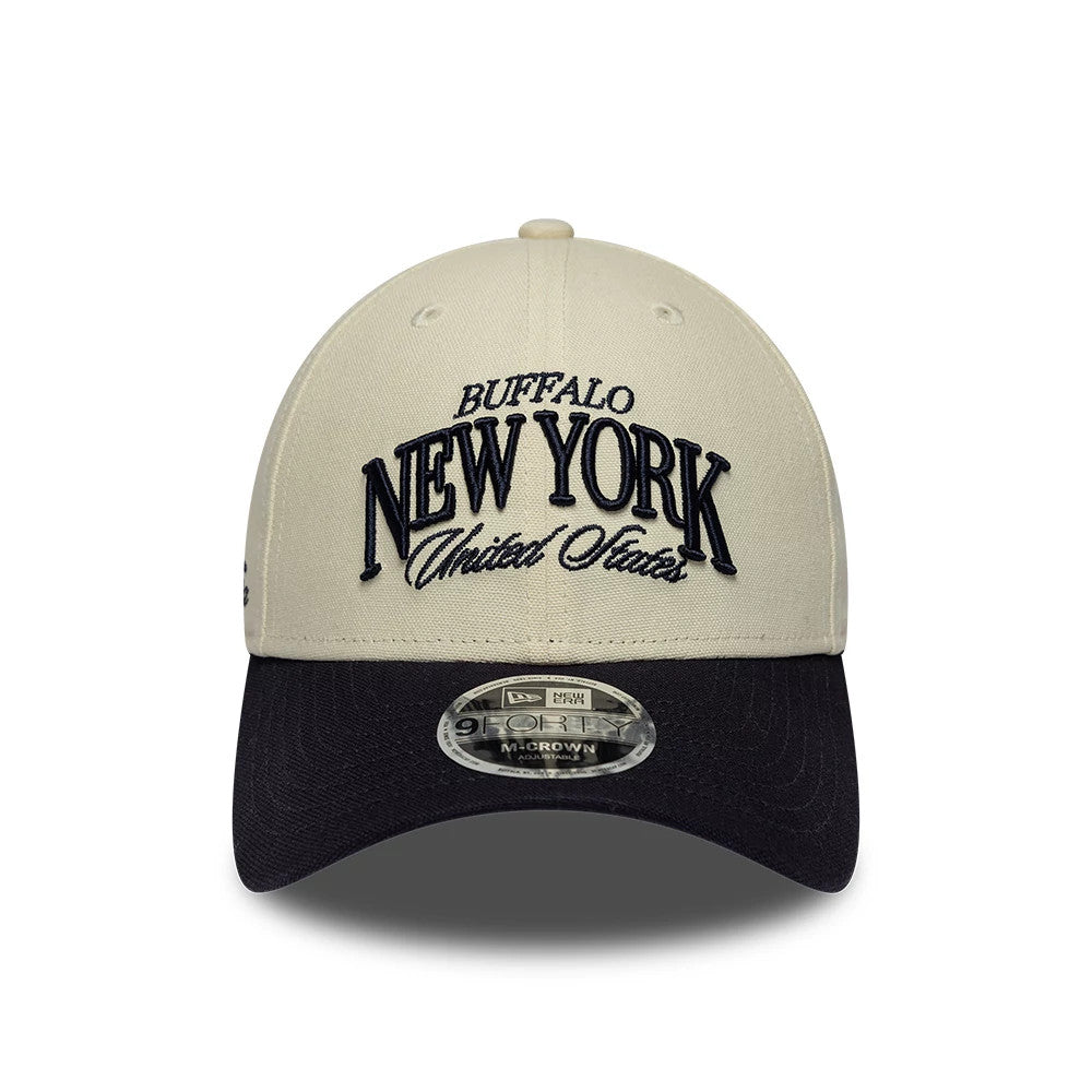 New Era New York Light Beige & Black 9FORTY M-Crown Adjustable Cap, front view showing raised black embroidered lettering of Buffalo New York United States on the light beige crown, with a black curved visor and 9FORTY size sticker.