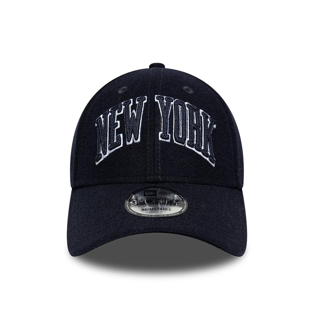 New York Yankees MLB Script Navy New Era 9FORTY Adjustable Cap, front view showing raised white embroidered New York script on the structured navy crown, with a black curved visor and a 9FORTY size sticker on the visor.