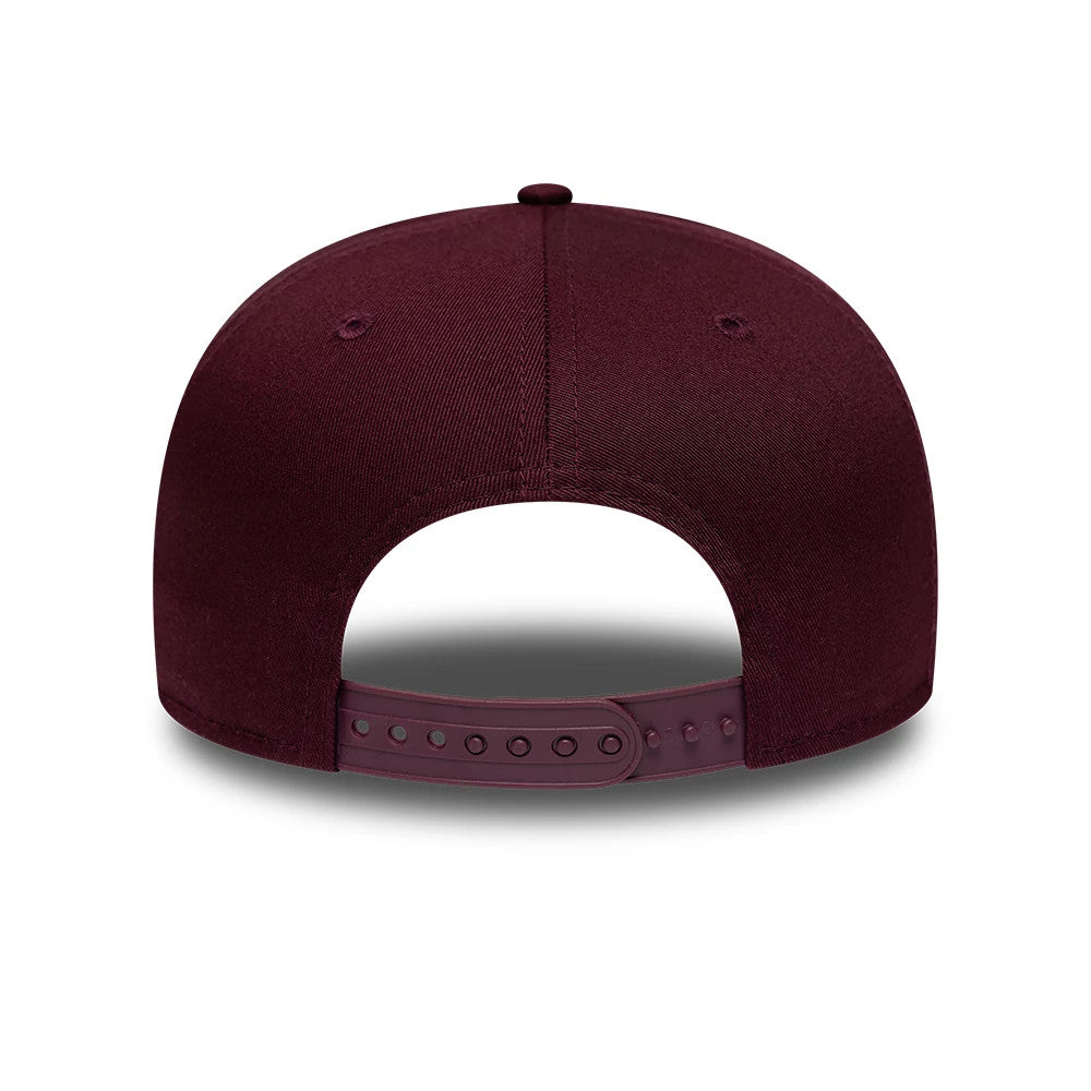 Yankees MLB League Essential Purple New Era 9FIFTY Original Fit Snapback Adjustable Cap, rear view showing the structured purple crown with matching embroidered eyelets and a plastic snap closure, highlighting the clean back panels and top button.