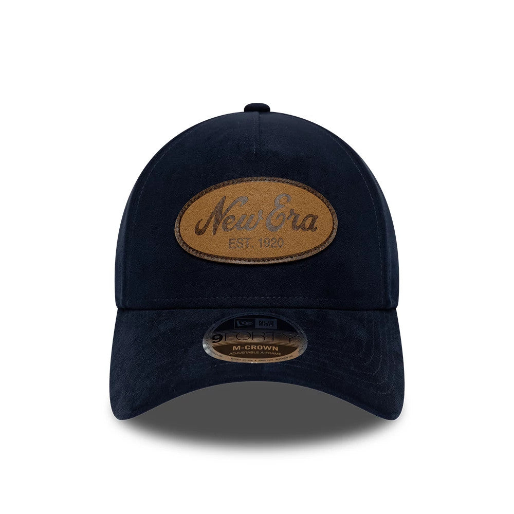 Pictured is this New Era Faux Suede 9FORTY M-Crown A-Frame cap in navy. 2