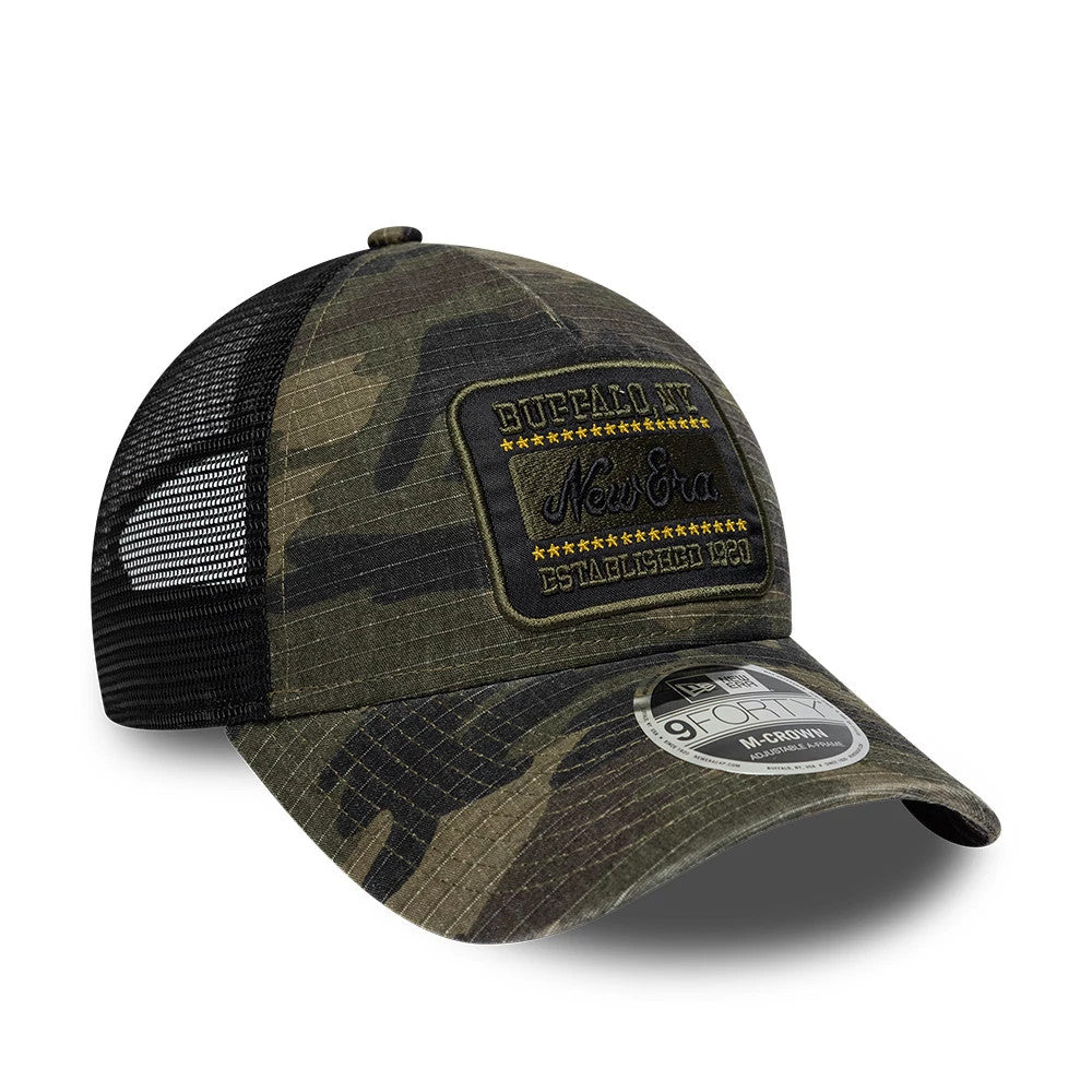 New Era Camo Woodland Camo 9FORTY M-Crown A-Frame Trucker Adjustable Cap, front three-quarter view showing a large black patch with Buffalo, NY and New Era lettering on the mesh crown, digital camouflage pattern and 9FORTY size sticker on the visor.