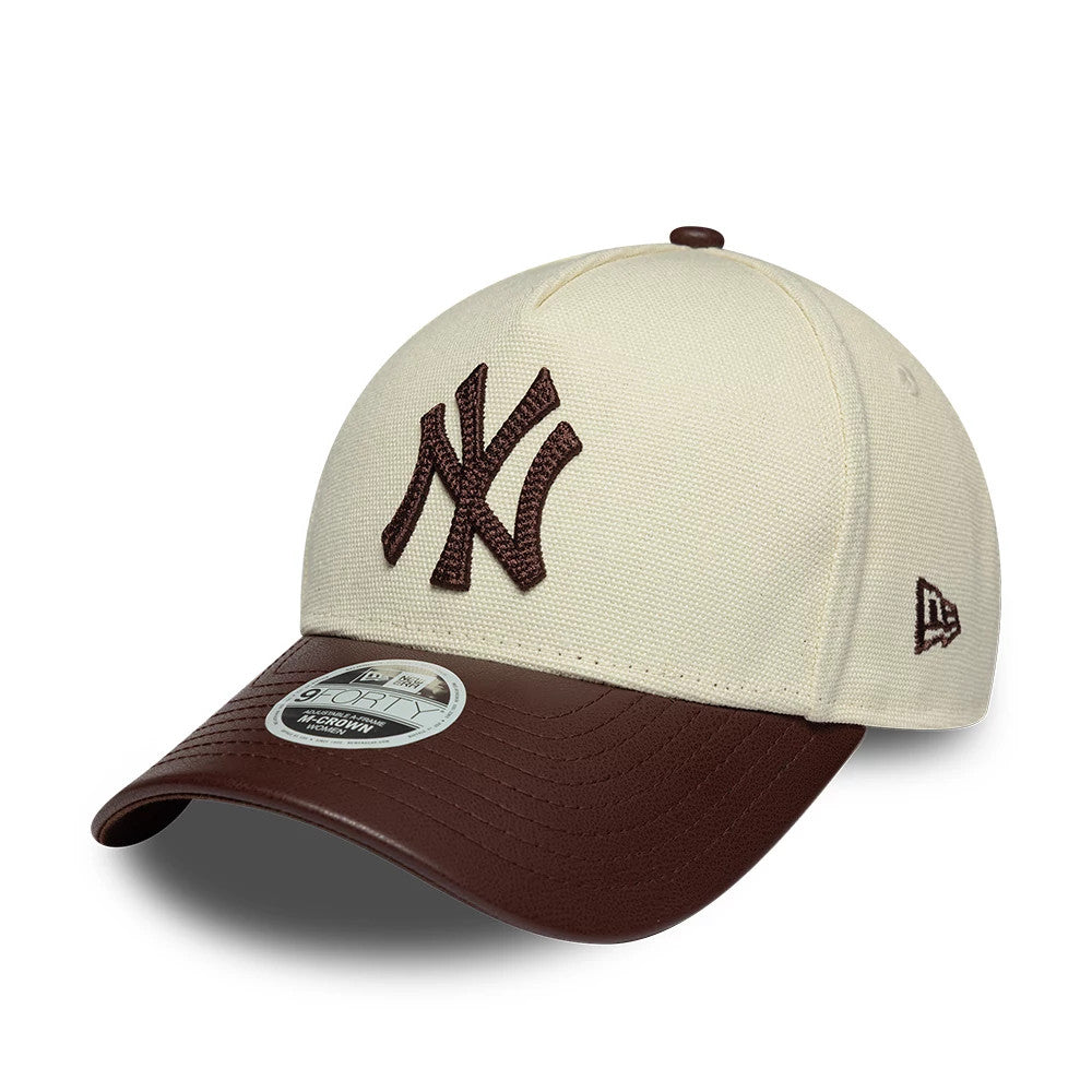 Yankees Womens MLB Fabric Mix Beige New Era 9FORTY M-Crown A-Frame Adjustable Cap, three-quarter view showing the raised brown NY logo embroidered on the front panel, contrasting brown curved visor, and New Era flag logo on the left side.
