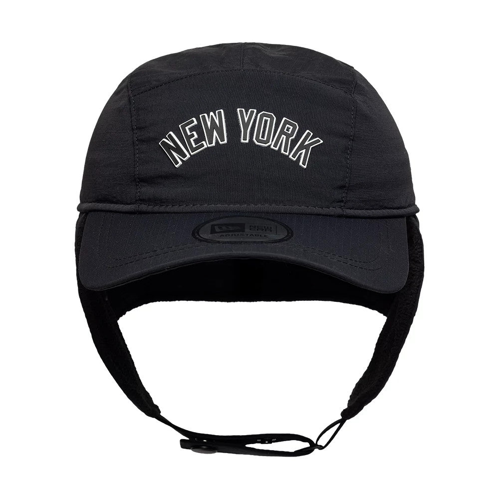 New Era New York Yankees MLB Fleece Black Dogear Camper Adjustable Cap, front view showing the white embroidered New York text on the crown, black visor with a New Era adjustable strap, and fleece-lined ear flaps hanging down.