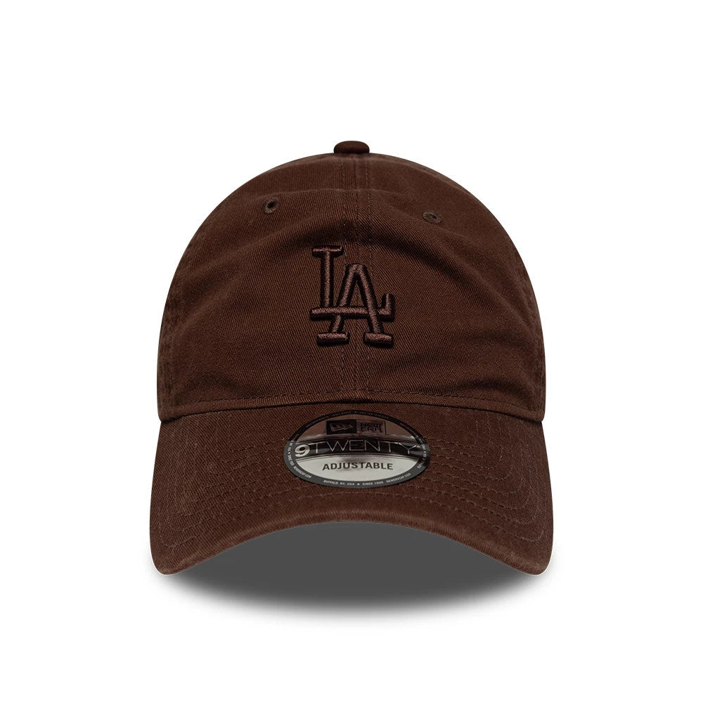 LA Dodgers MLB Washed Midi Logo Brown New Era 9TWENTY Adjustable Cap, front view showing a brown embroidered LA logo on the unstructured crown, a curved visor with a 9TWENTY size sticker, and matching brown eyelets and top button.