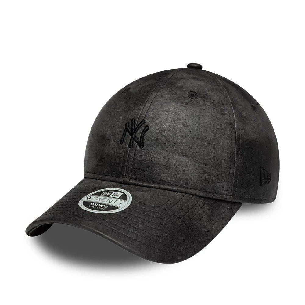 New York Yankees Womens MLB Washed PU Black New Era 9TWENTY Adjustable Cap, three-quarter view showing the raised black NY logo on the front panel, curved black visor with 9TWENTY size sticker, and the New Era flag logo on the left side.