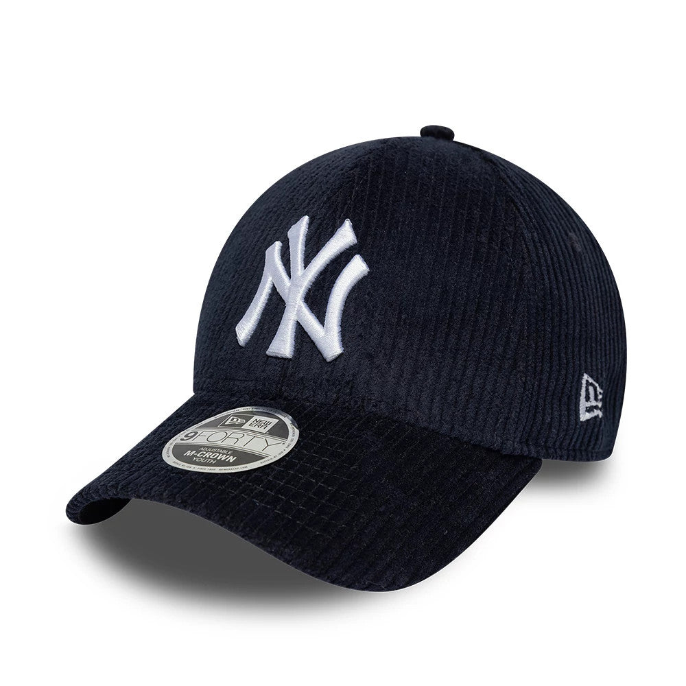 New York Yankees Youth MLB Cord Navy New Era 9FORTY M-Crown Adjustable Cap, three-quarter view showing a raised white embroidered NY logo on the structured navy cord crown, a curved navy visor with a 9FORTY size sticker.