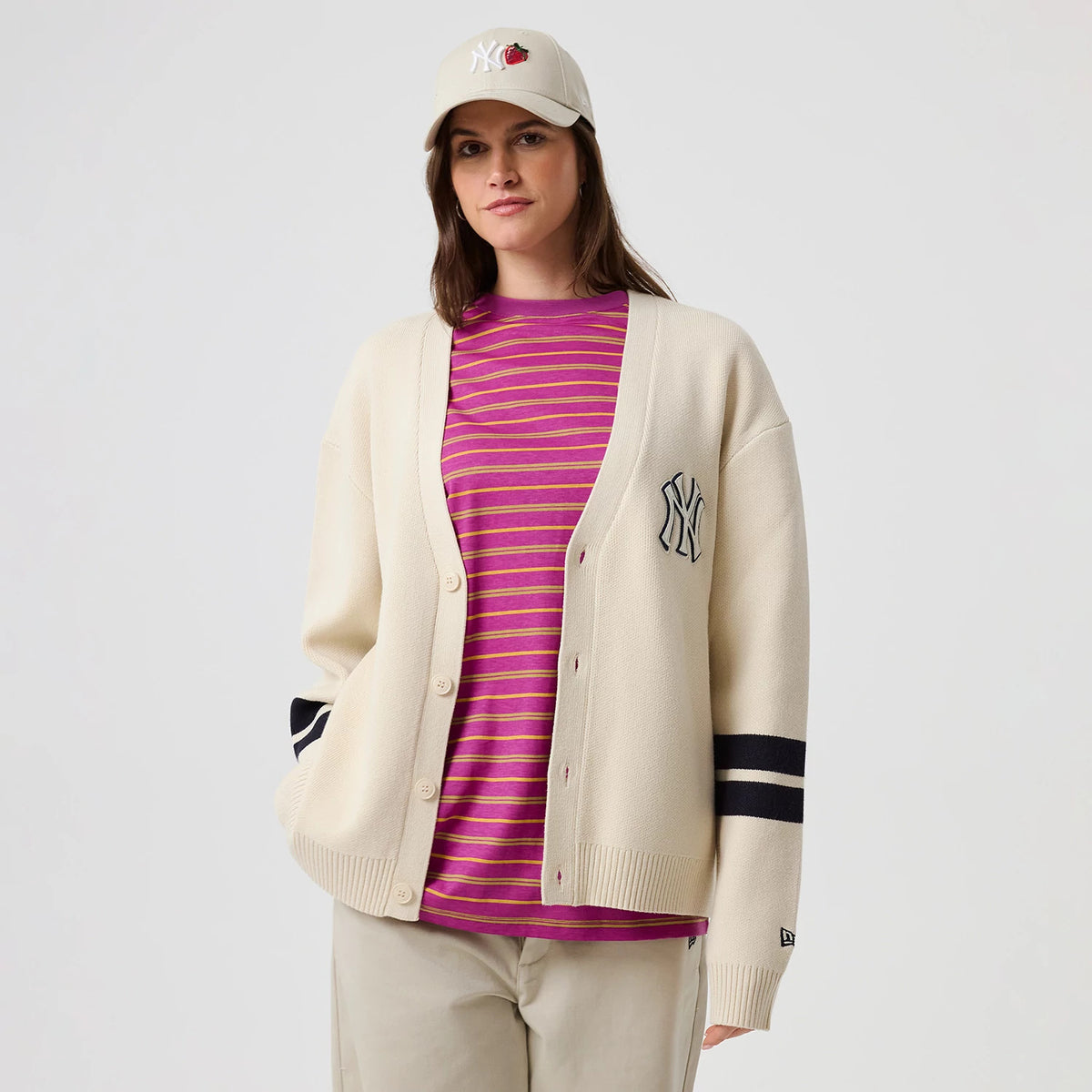 The model is wearing this MLB Knit New York Yankees Cardigan in light beige. 4
