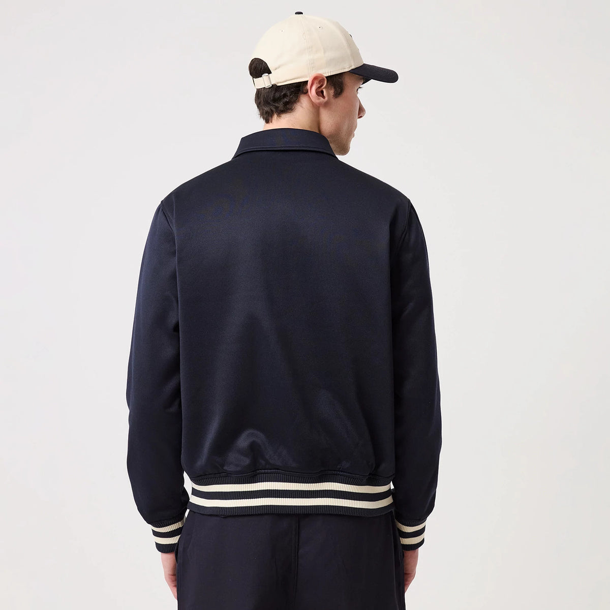 The model is wearing this MLB New York Yankees Collared Jacket in navy. 2