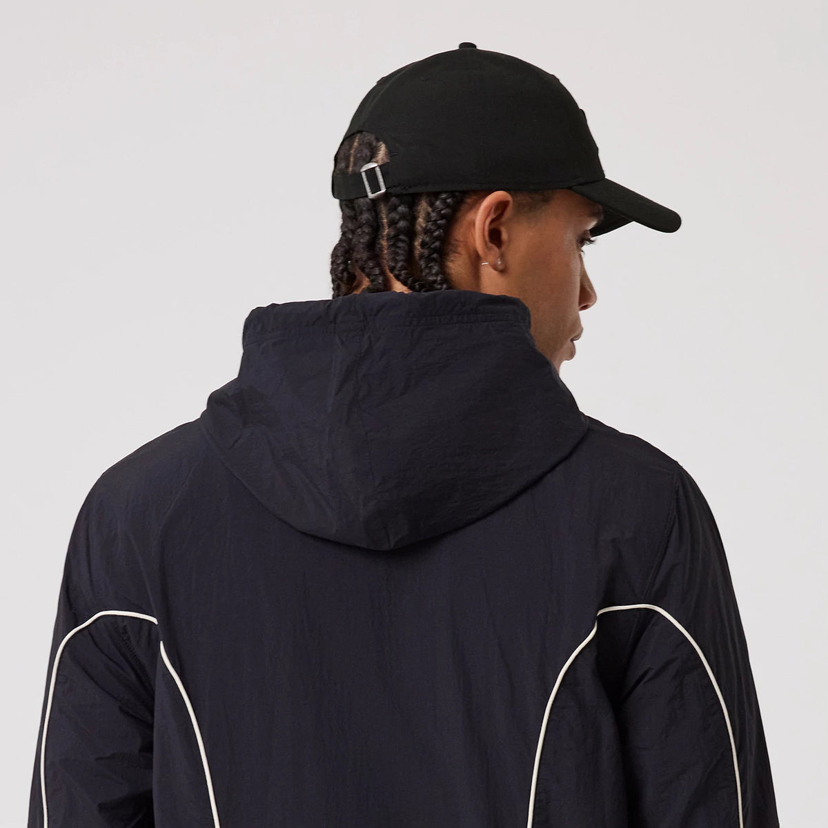The model is wearing this MLB Piping New York Yankees Track Jacket in navy. 7