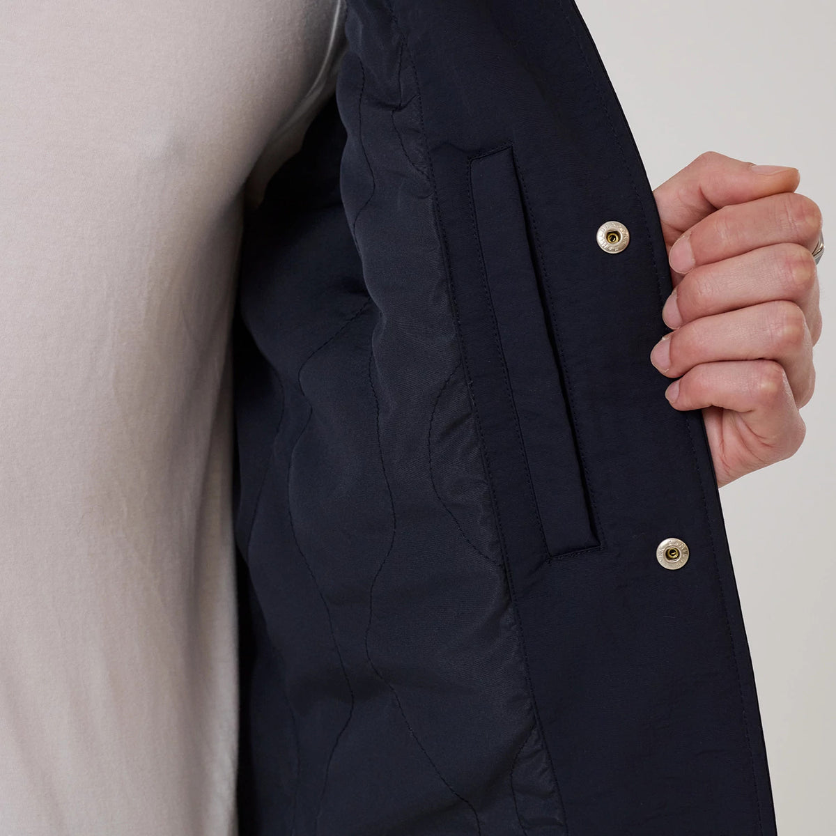 The model is wearing this MLB New York Yankees Coach Jacket in navy. 7