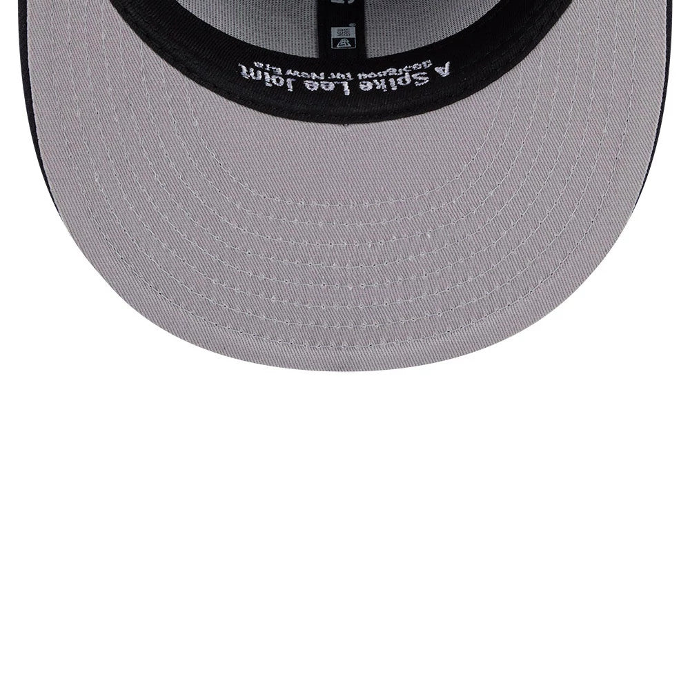 New York Yankees MLB X Spike Lee Patches Navy New Era 59FIFTY Fitted Cap, inside view showing the grey undervisor, black taping with white script, and a black sweatband featuring the embroidered New Era logo and designer details.