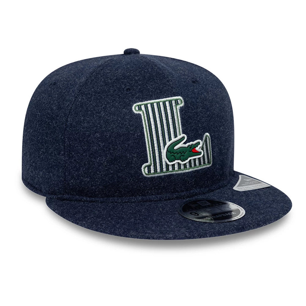 Pictured is this Lacoste X New Era Retro Crown 9FIFTY cap in navy. 3