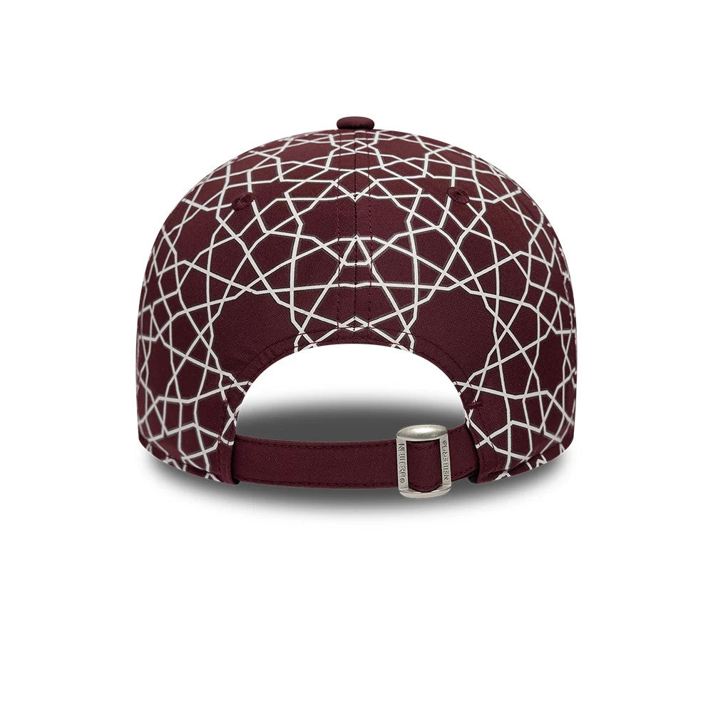 Sail GP Dubai Abu Dhabi Air Event Dark Red New Era 9FORTY Adjustable Cap, rear view showing intricate white geometric pattern across the structured dark red crown, buckle closure with a clasp, and matching dark red fabric strap.