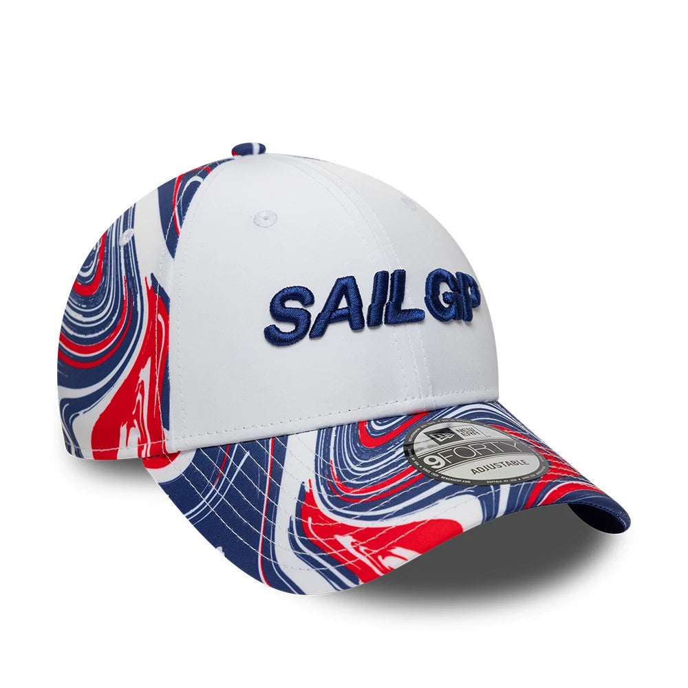 Sail GP UK Air Event White New Era 9FORTY Adjustable Cap, front view showing the navy embroidered Sail GP lettering on the white front panel, with a swirling red, white and blue pattern on the visor, plus a 9FORTY size sticker.
