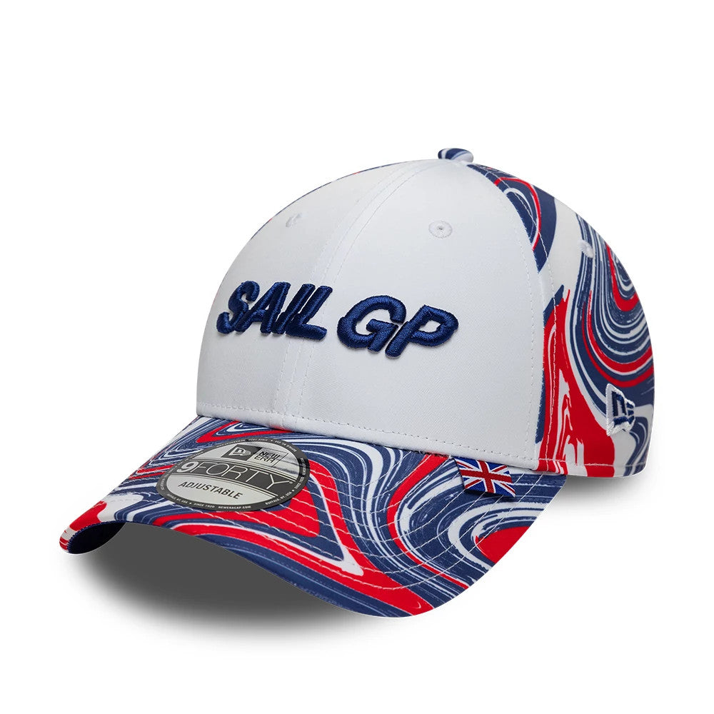 Sail GP UK Air Event White New Era 9FORTY Adjustable Cap, three-quarter view showing the raised blue embroidered SAIL GP logo on the front panel, red and blue swirl pattern on the visor, and 9FORTY size sticker on the cap's visor.