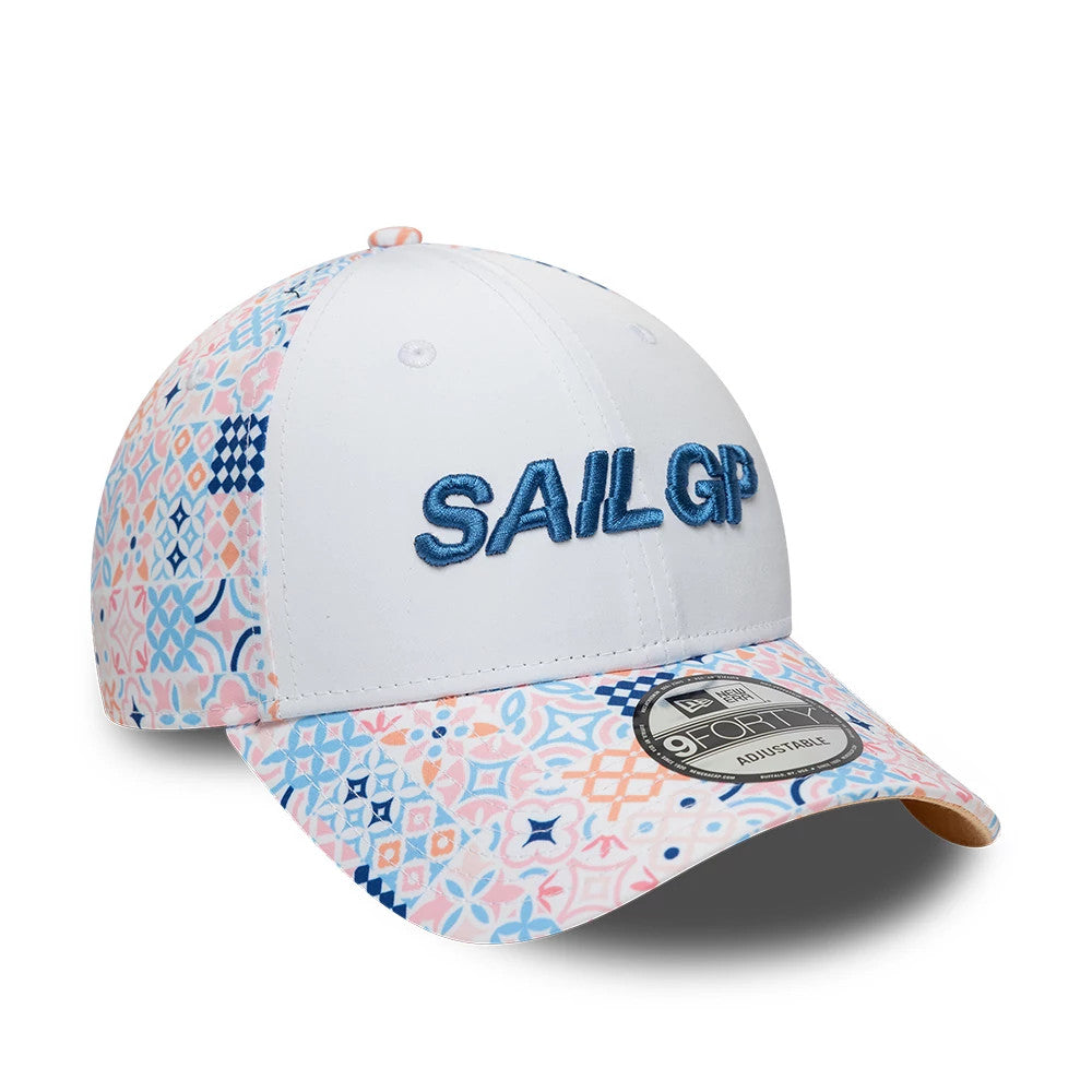 Sail GP Mediterranean Air Event White New Era 9FORTY Adjustable Cap, three-quarter view showing blue raised embroidered Sail GP lettering on the white front panel, colourful mosaic pattern on the visor and crown, and 9FORTY size sticker on the visor.
