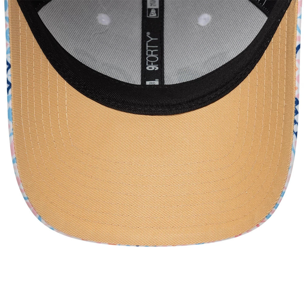 Sail GP Mediterranean Air Event White New Era 9FORTY Adjustable Cap, inside view showing a beige undervisor with black sweatband, 9FORTY taping along the seams, and a glimpse of the colourful patterned edge around the visor.