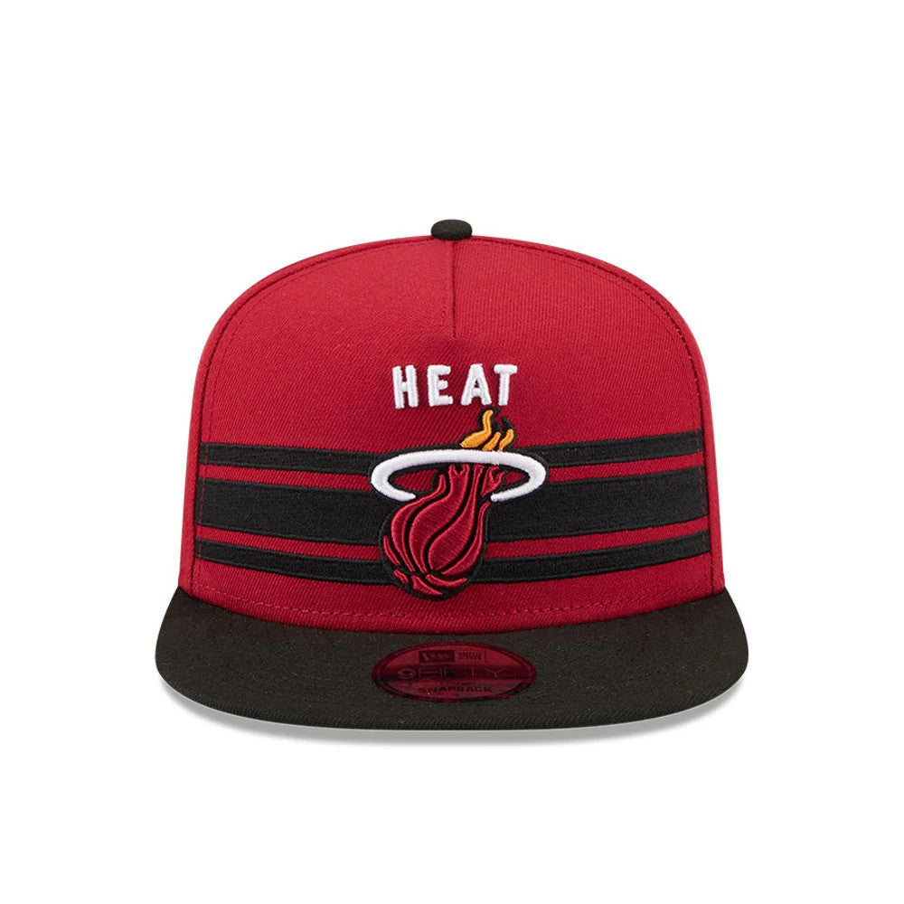 Miami Heat NBA Tip Off 2026 Dark Red New Era 9FIFTY A-Frame Snapback Adjustable Cap, front view showing the raised Heat logo and text in white and red embroidery on the dark red crown, with a black flat visor and red 9FIFTY size sticker.