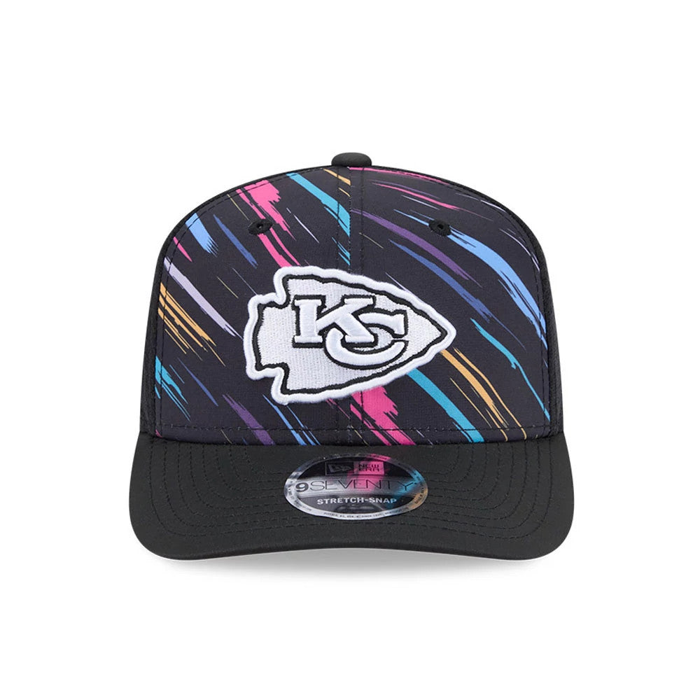 Chiefs NFL City Connect 2026 Black New Era 9SEVENTY Stretch Snap Adjustable Cap, front view showing the white embroidered Chiefs logo on a colourful abstract-patterned crown, black curved visor and 9SEVENTY size sticker on the centre of the visor.