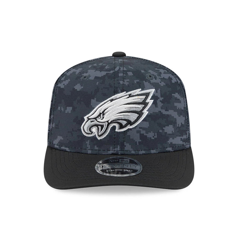 Eagles NFL Digi Camo & Black New Era 9SEVENTY Stretch Snap Adjustable Cap, front view showing the raised embroidered eagle logo on the digi camo front panels, with a black curved visor featuring the 9SEVENTY size sticker.