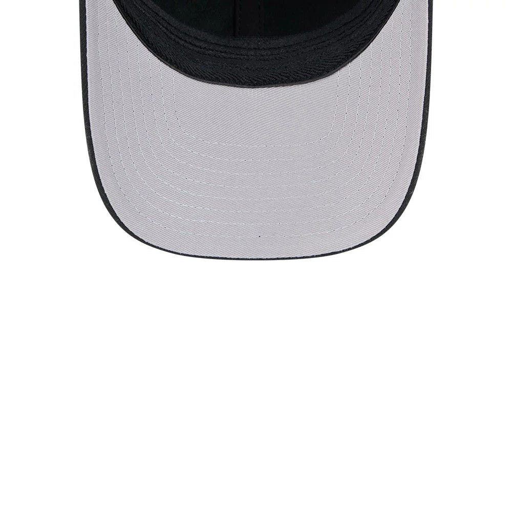 Miami Heat NBA Team Black New Era 39THIRTY M-Crown Stretch Fit Cap, inside view showing the white undervisor with stitching patterns, black interior sweatband, and dark taping along the seams for a structured fit.