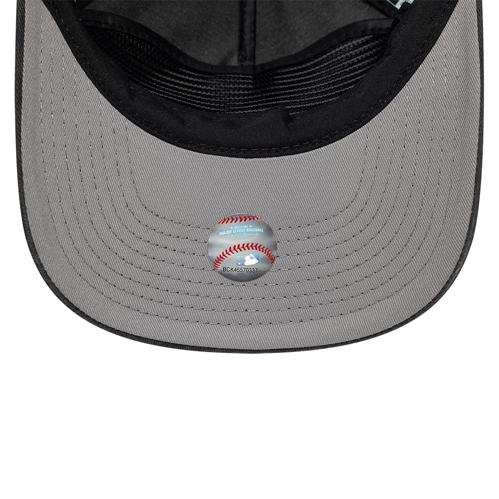 Chicago White Sox MLB Black New Era 19TWENTY Adjustable Cap, inside view showing the grey undervisor with detailed stitching, a central baseball-themed sticker, and black interior sweatband and taping for a structured fit.