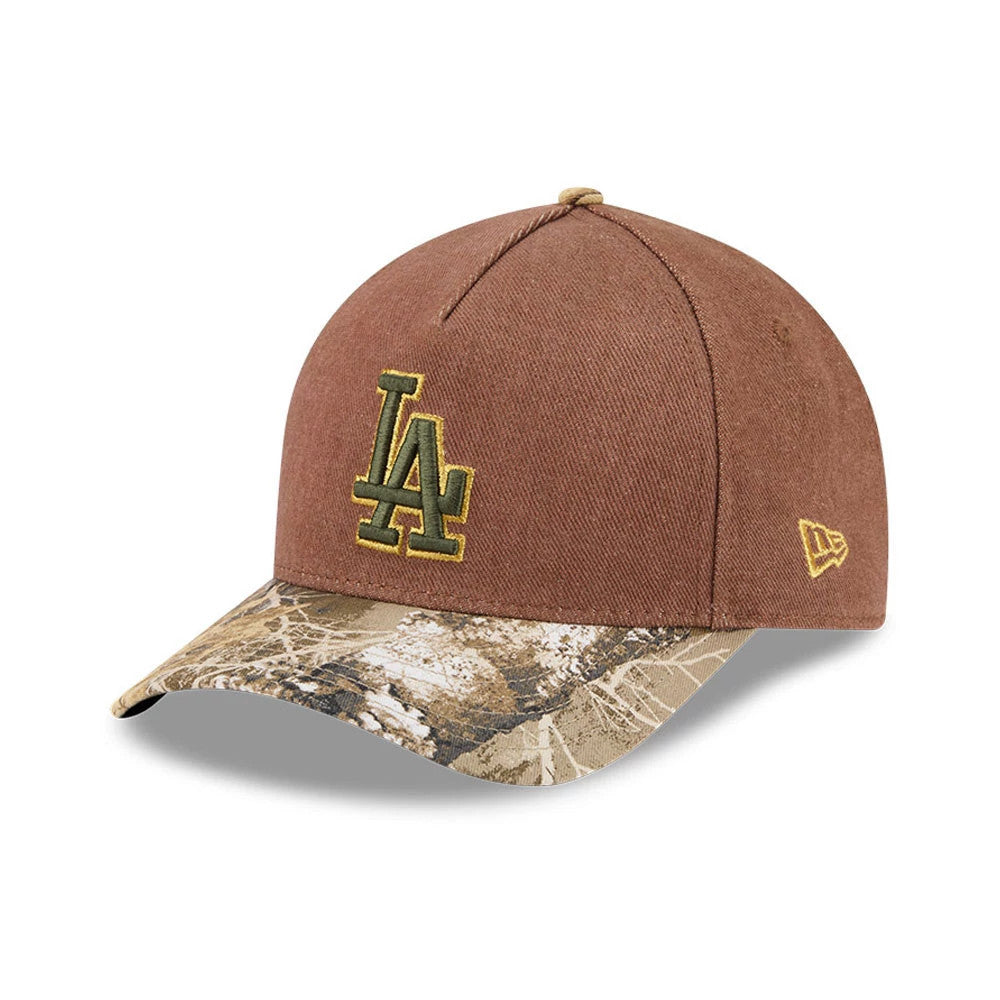 Dodgers MLB Cotton Twill Dark Beige New Era 9FORTY M-Crown A-Frame Adjustable Cap, three-quarter view showing a raised dark gold LA logo embroidered on the front panel, camouflage-patterned visor and the New Era flag logo on the left side.