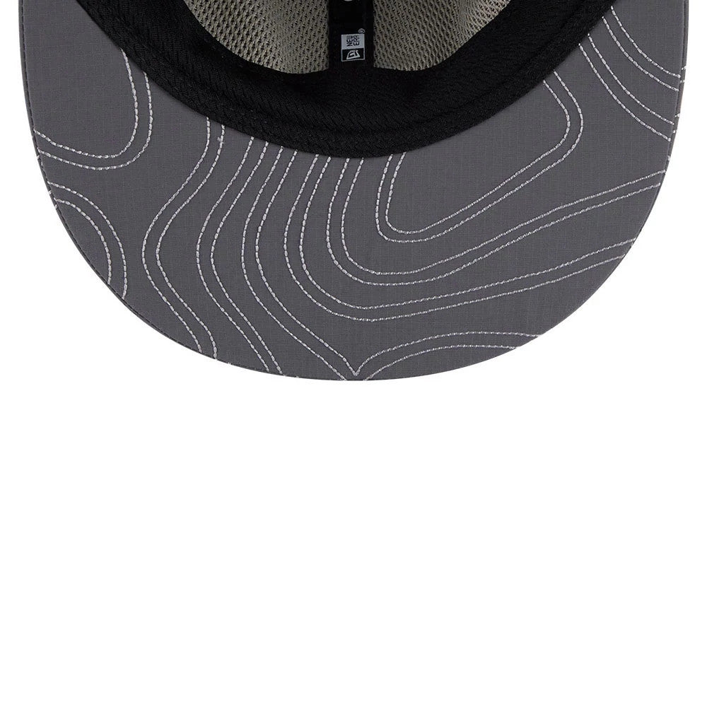 New Era Elevated Basics Open Grey Retro Crown 9FIFTY Adjustable Cap, inside view showing grey contour line pattern on the underside of the visor, black sweatband lining, and beige mesh fabric with tag detail near the centre.