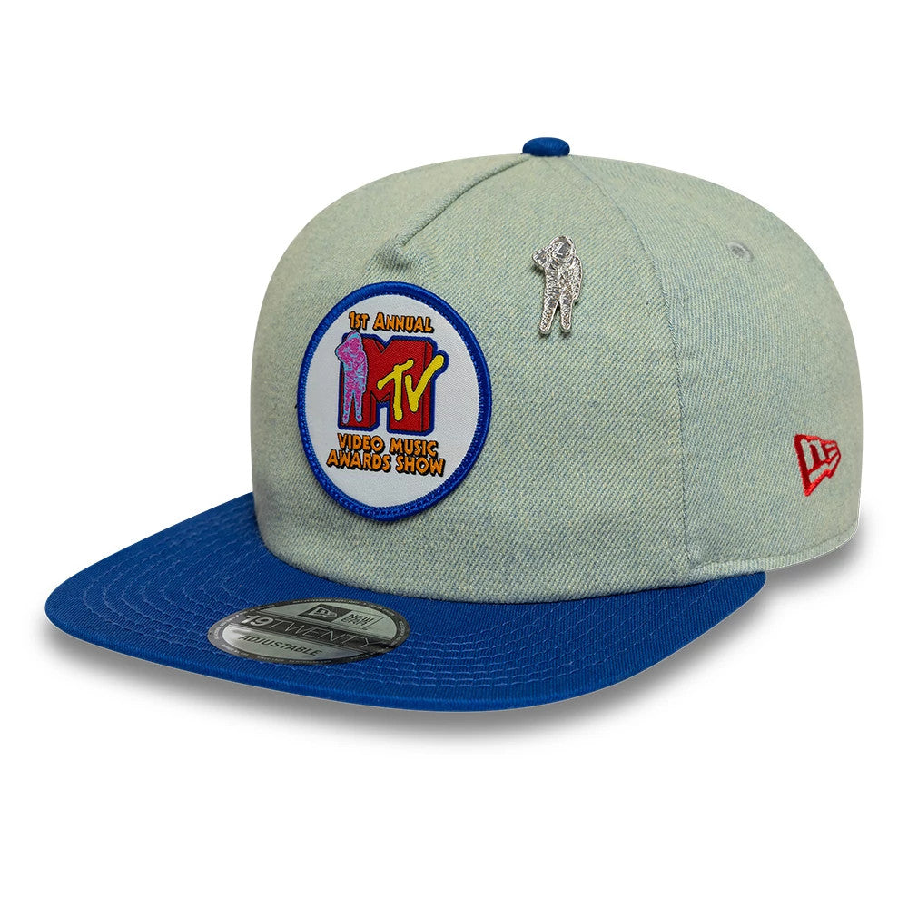 MTV Awards Show Blue New Era 19TWENTY Adjustable Cap, front view showing a white embroidered MTV logo patch on the light blue crown, a silver MTV pin above it, and a contrasting blue visor with a 19TWENTY size sticker.