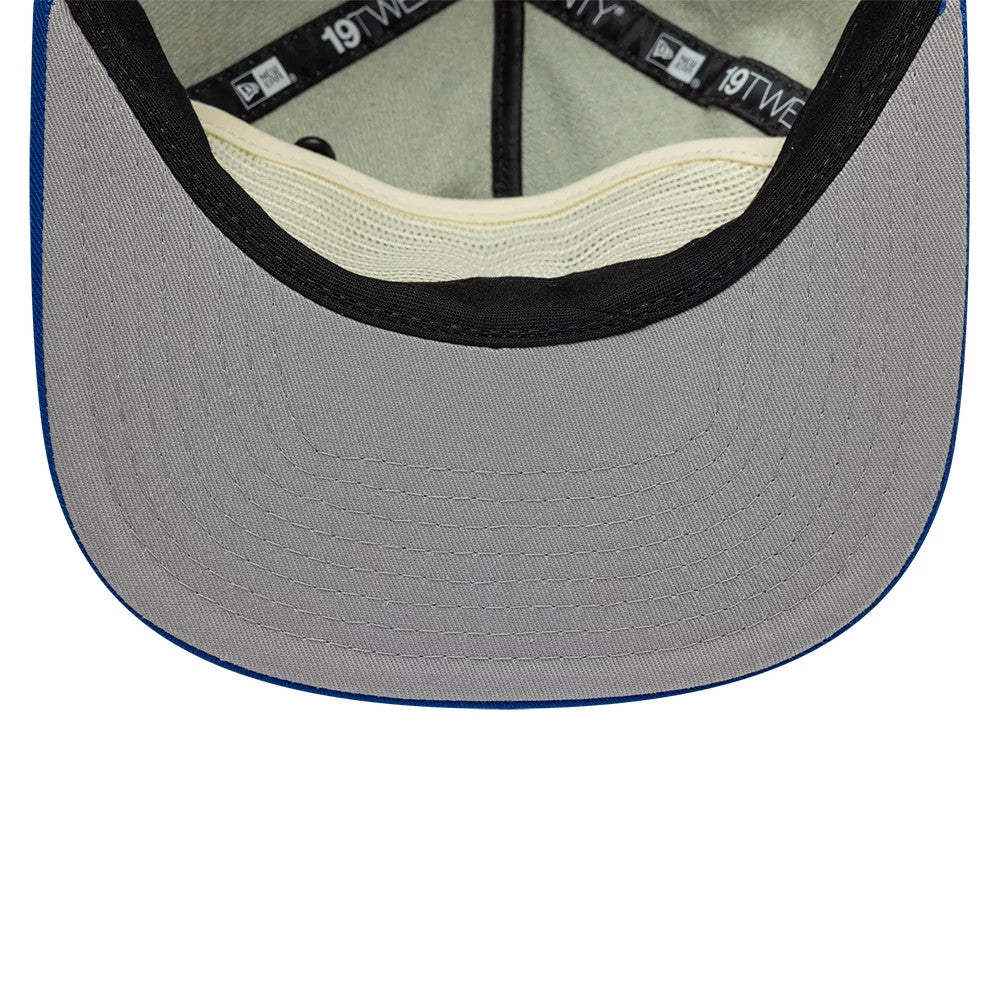 MTV Awards Show Blue New Era 19TWENTY Adjustable Cap, inside view showing grey undervisor, black taping with white 19TWENTY branding, a cream-coloured sweatband, and a distinct blue edge framing the structured crown panel.