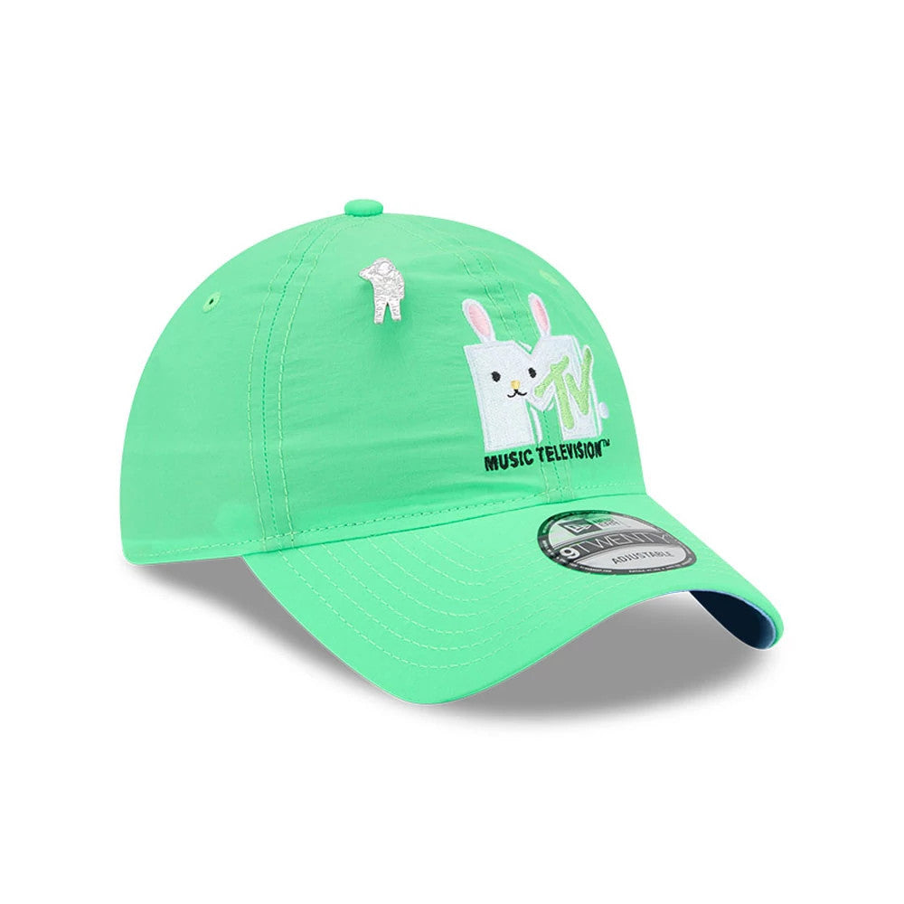 MTV Logo Bright Green New Era 9TWENTY Adjustable Cap, front three-quarter view showing the embroidered white MTV logo with pink ears and black text on the front, top button, and a grey and black 9TWENTY size sticker on the curved visor.