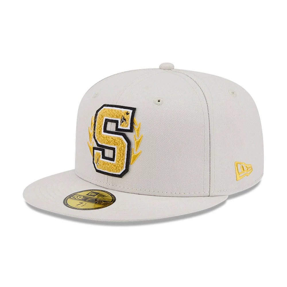 Star Trek Logo Light Beige New Era 59FIFTY Fitted Cap, three-quarter view showing a prominent chenille S logo on the front panel with embroidered yellow laurel wreaths, a flat light beige visor and a gold 59FIFTY size sticker.