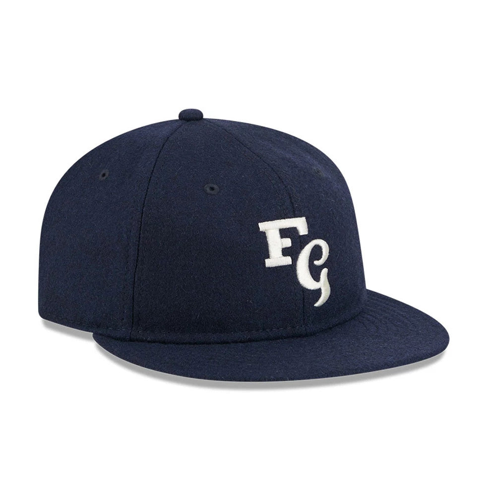 Pictured is this Fear Of God X MLB New York Yankees Retro Crown 59FIFTY Fitted cap in navy. 4