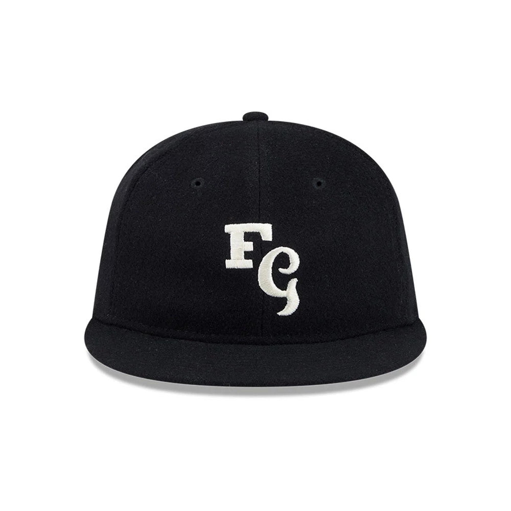 Chicago White Sox Fear Of God X MLB Black Retro Crown New Era 59FIFTY Fitted Cap, front view showing the white raised embroidery FG on the structured black crown, complemented by matching black flat visor and eyelets.