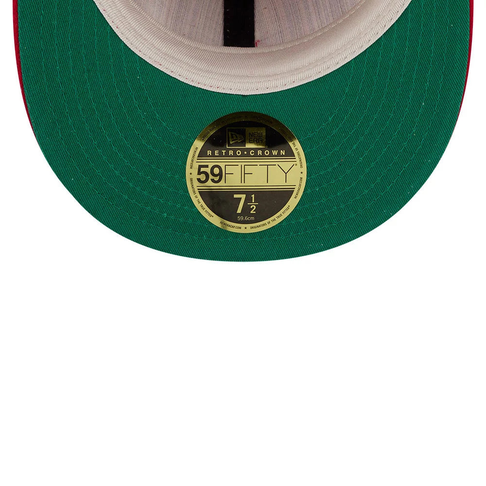 Cincinnati Reds Fear Of God X MLB Open Red Retro Crown New Era 59FIFTY Fitted Cap, inside view showing the distinctive green undervisor with a gold 59FIFTY size sticker, highlighting the white sweatband and black interior taping.