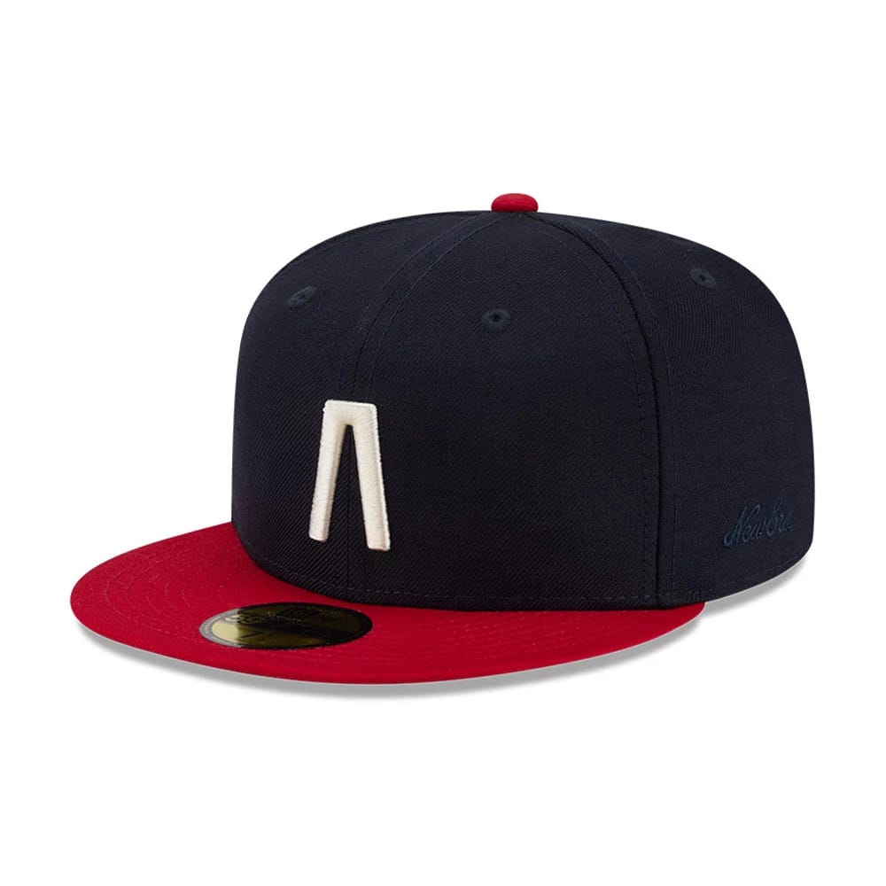 Pictured is this Fear Of God X MLB Logo 59FIFTY Fitted cap in navy. 1