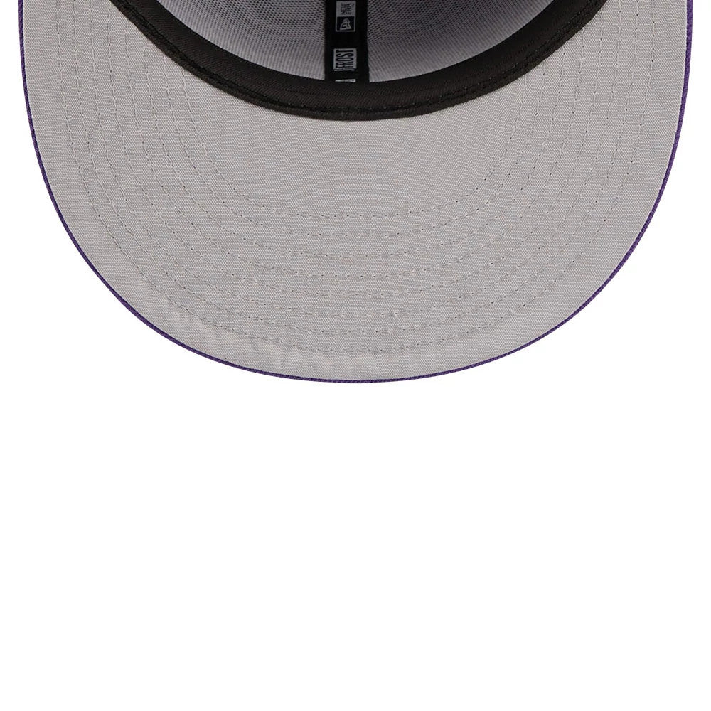 LA Lakers NBA X J-FROST Purple New Era 59FIFTY Fitted Cap, inside view showing light grey undervisor with detailed stitching, black sweatband encircling the interior, and New Era taping in black running vertically along the centre of the crown.