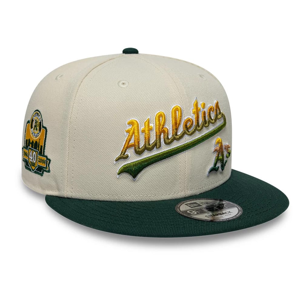 Pictured is this MLB Ombre Script Athletics 9FIFTY Snapback cap in light beige & dark green. 1