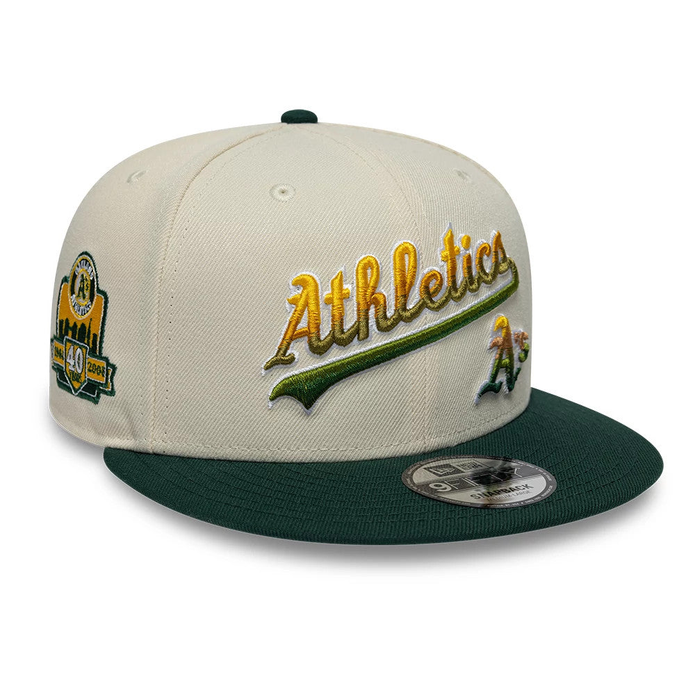 Pictured is this MLB Ombre Script Athletics 9FIFTY Snapback cap in light beige & dark green. 1