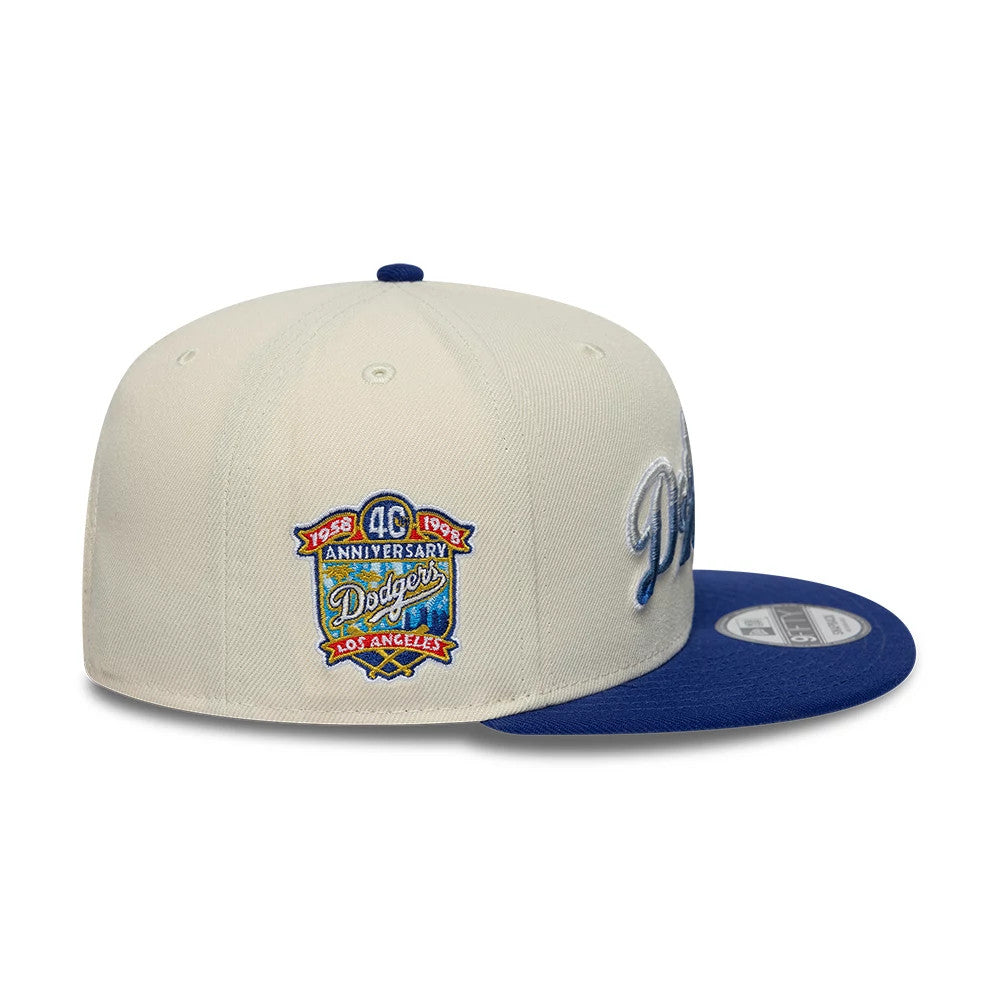 Pictured is this MLB Ombre Script Los Angeles Dodgers 9FIFTY Snapback cap in light beige & blue. 4
