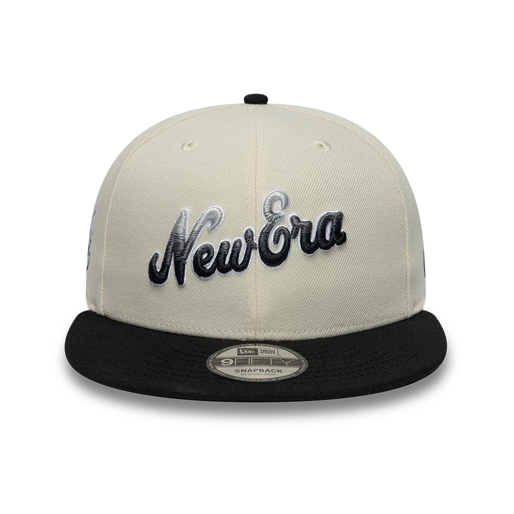 Pictured is this New Era Ombre Script 9FIFTY Snapback cap in light beige & black. 2